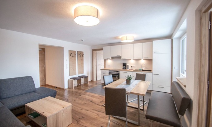 Bichlbach Apartment | 60 m² modern vacation apartment with balcony, free bathing lake, 100 m to the ski area