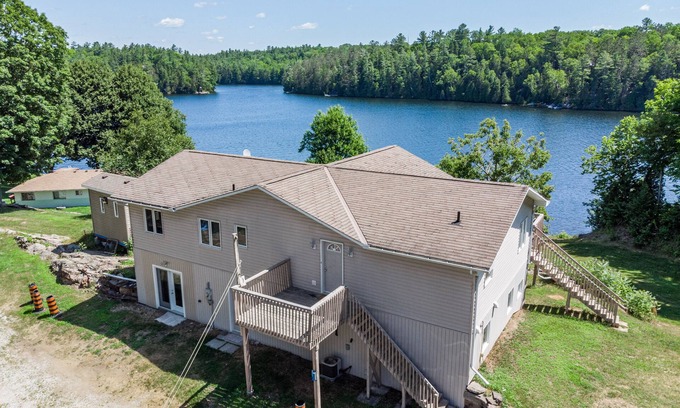 Minden Hills Cottage | 7 bedrooms, 2 kitchens, large deck overlooking lakefront cottage. Max 14 persons