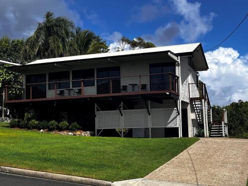 Rainbow Beach House | 76 Cooloola Drive - Rainbow Beach. Aircon. Wifi. Ocean views