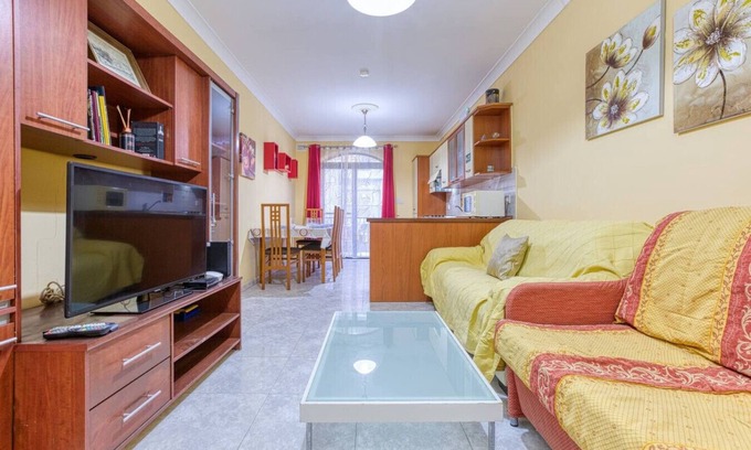 Bugibba Apartment | A colourful 3BR home, with Smart TV & Balcony