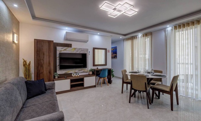 Bugibba Apartment | A modern apartment block in the heart of Bugibba. All one-bedroom flats, stylishly finished and fully equipped with comfort, ideally located close to shops, services, and all amenities.