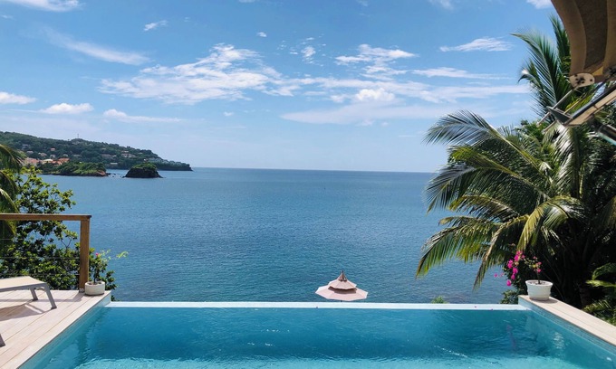 Vigie Villa | A Waterfront Luxury Tented Experience, with a Saltwater Infinity Pool and Beach.