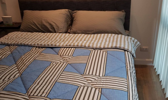 Poblacion District Condo | Abreeza Place with indoor parking and balcony