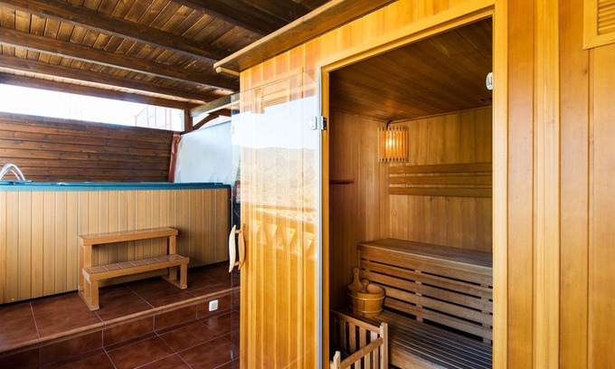 Totalan Apartment | Air-Conditioned Apartment in the Mountains with Terrace, Mountain Views, Optional Sauna & Whirlpool; Parking Available, Free Wi-Fi