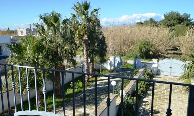 Roca Vecchia Apartment | Air-Conditioned Apartment Near the Beach with Spacious Balcony & Garden; Pets Allowed; Parking Available