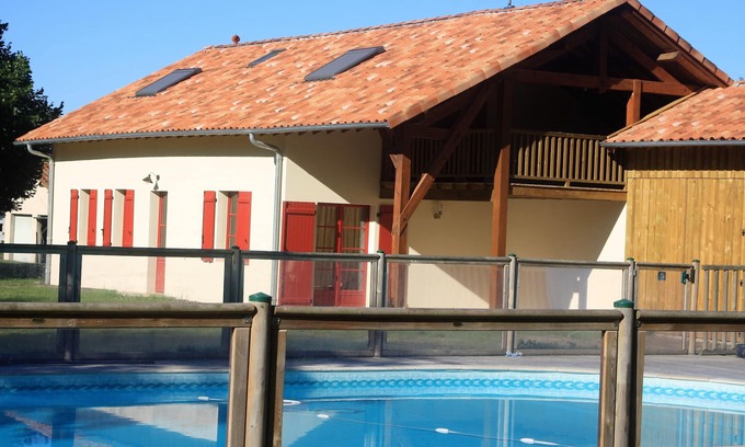 Saint-Gor Cottage | Air-conditioned cottage 8 people with heated pool in the heart of the Landes forest