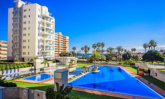 La Mata Apartment | An apartment with two bedrooms with in residencia with swimming pool in La Mata