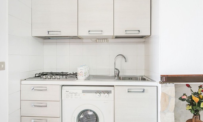 Paduledda Apartment | Apartment with Air Conditioning, Terrace and Sea View; Parking available