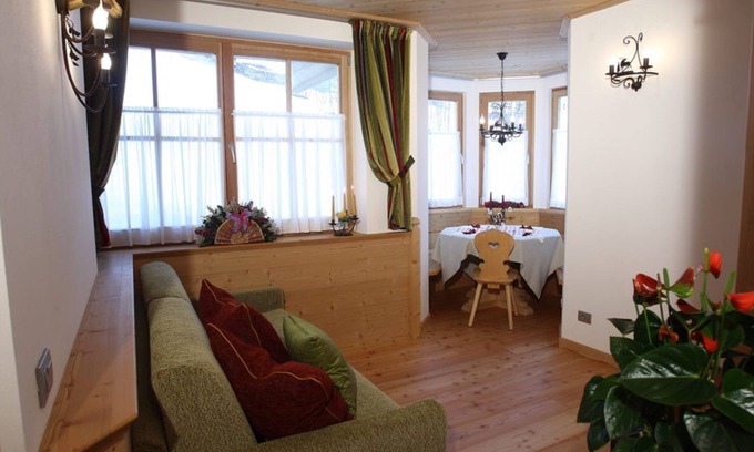 Rocca Pietore Apartment | Apartment 'Appartamento Bilo 4' with Mountain View, Shared Garden and Wi-Fi