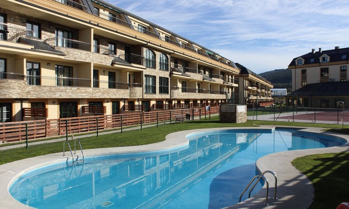 Barreiros Apartment | Apartment Costa Reinante Spa Beach Las Catedrales. Urbanization with spa.