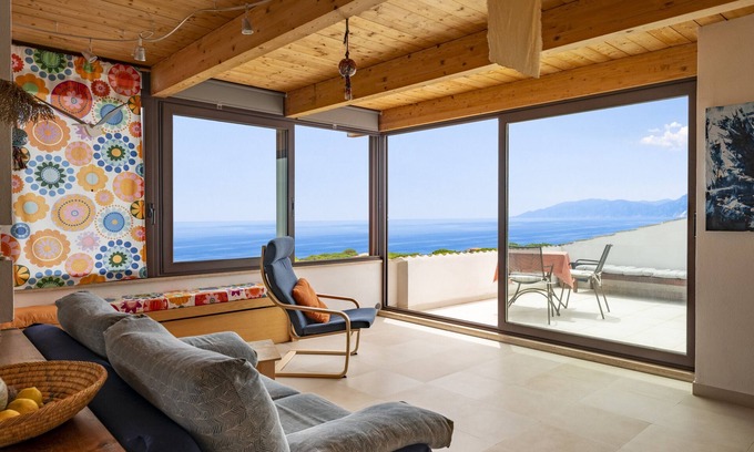 Cala Gonone Apartment | Apartment 'Dream In The Sky' with Sea View, Wi-Fi and Air Conditioning