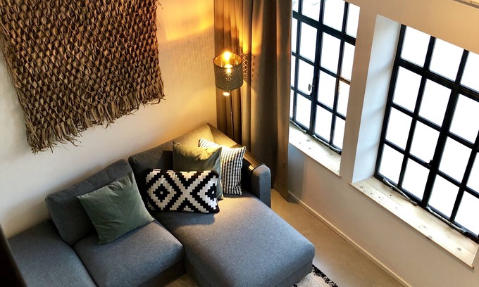 Heerlen Apartment | Apartment for two people in renovated former primary school with lovely garden.