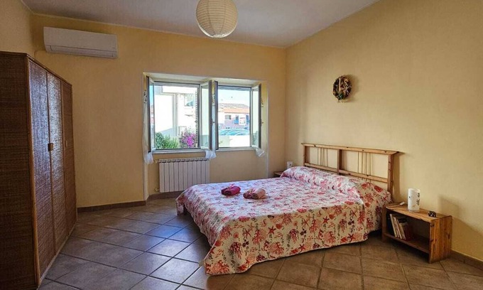 Fiumicino Apartment | Apartment in central area with outdoor space 10 minutes from the airport