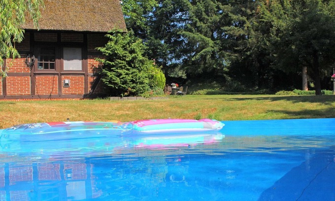 Kirchdorf Apartment | Apartment in Kirchdorf with Swimming Pool, Garden, Terrace