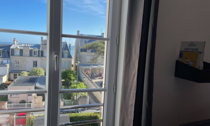 Saint-Regnobert-de-la-Cote-de-Nacre Apartment | Apartment La Vigie - 30 m from the sea, small sea view