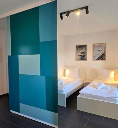 Ibbenbueren Apartment | APARTMENT PD23 ALTE FEUERWACHE I Ganze Wohnung I 5 Einzelbetten I 3 Zimmer I 3min CityHospital I 50m Supermarkt I Küche I SmartTV