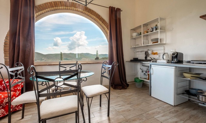Capalbio Apartment | Apartment 'Tamerice' with Shared Pool, Wi-Fi and Air Conditioning