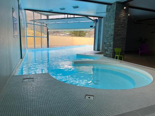Cauterets Apartment | Appartement 2-4 personnes avec 1 chambre - Résidence les 100 lacs à Cauterets avec balcon et piscine chauffée