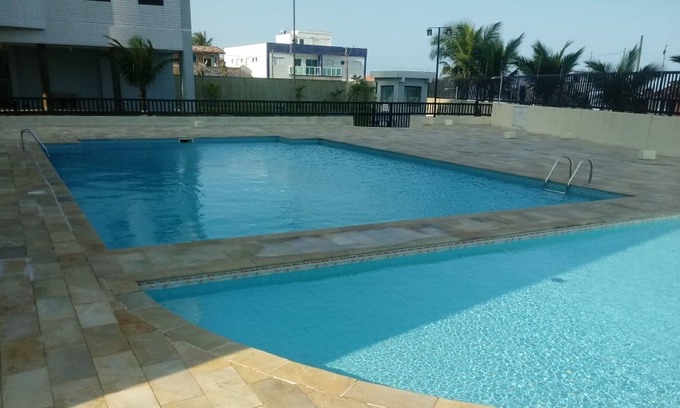 Itanhaem Condo | Apto Satelpraia foot in the sand