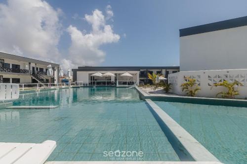 Porto Seguro House | Aptos em condo com churrasq e piscina na melhor localização Praia do Mutá DVBs