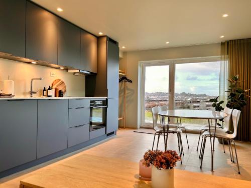 Haugesund Apartment | Basement apartment with sea view