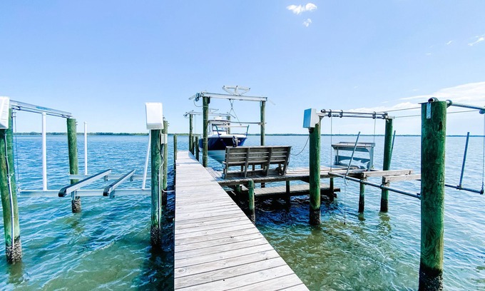 Alligator Point House | BEACH FRONT to BAY with boatdock, swimming pool, pickleball courts and kayaks.