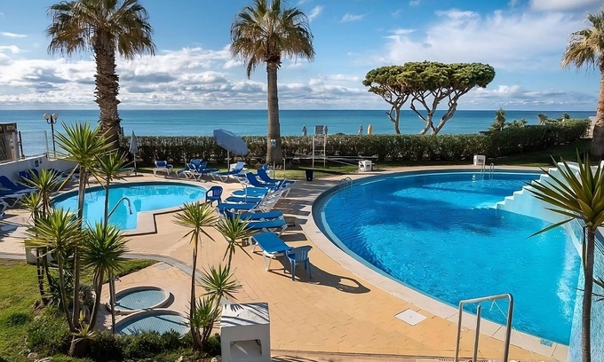 Oura Hotel | Beachfront 5-Star Resort! 3 Comfortable Units, Outdoor and Indoor Pool!