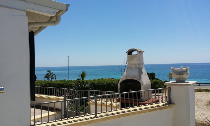 Torre San Giovanni House | Beachfront holiday home 30 meters from the water