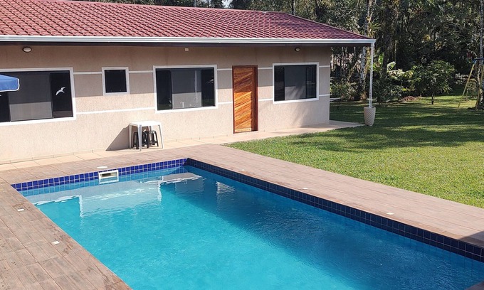 Morretes Cottage | Beautiful House! Enjoy nature and cool off in the pool.