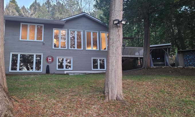 Feronia House | Beautiful lakefront home on Trout Lake! Hot tub and movie room included!