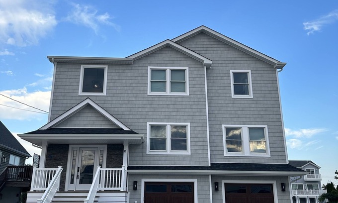 Beach Haven West House | Beautiful new home with heated pool on a lagoon