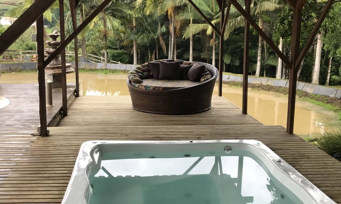 Aurora Cottage | Beautiful site with swimming pool and pond to relax in