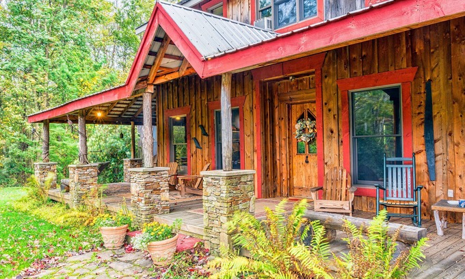 Champion Cabin | Beautiful spacious country home set on 22 acres that sleeps 27 people.