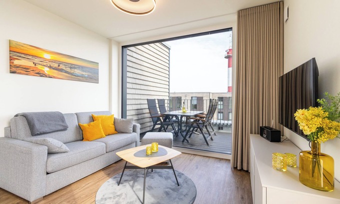 Marienleuchte Apartment | BeltBlick 24 - Roof terrace. Sea view. Sauna. Design.