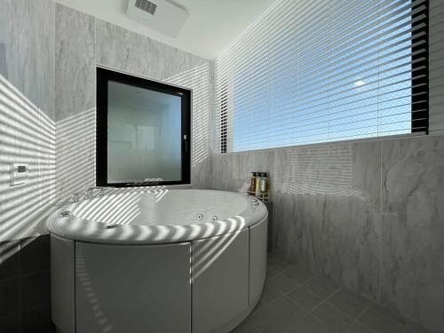 Hiroshima City Centre Apartment | bHOTEL Nekoyard - Scenic Penthouse Studio with Jacuzzi & Spacious Terrace
