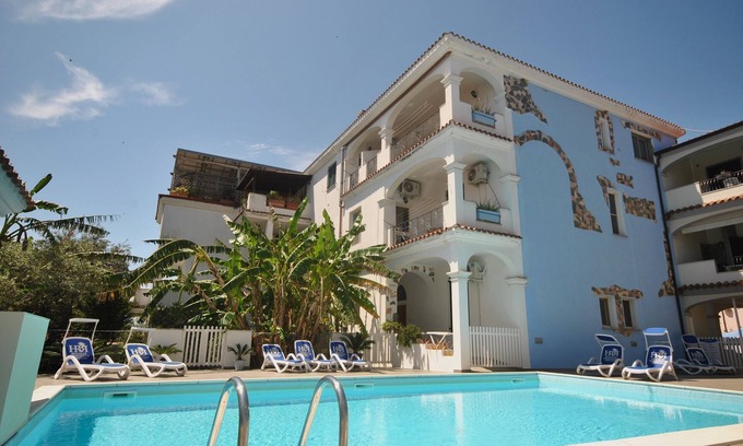 Orosei Apartment | Big terrace with BBQ and sight on Pool and exotic garden