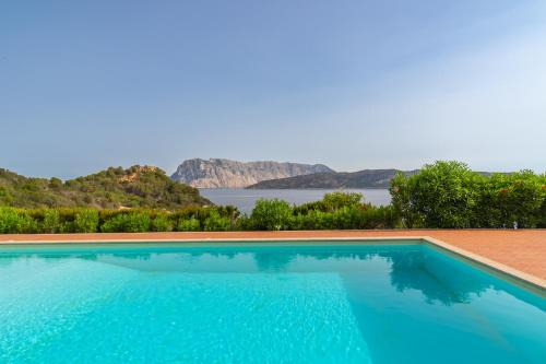 Capo Coda Cavallo House | Blue Dawn by DomusAway