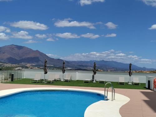 Castillo de Sabinillas Apartment | Blue Sunset Retreat