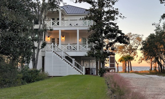 Gulf Breeze House | BREATHTAKING Waterfront Home with private dock and sunset vistas sleeps up to 24