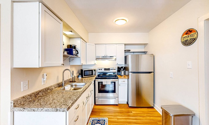 Glens Falls Apartment | Bright apartment with large covered balcony - steps to town