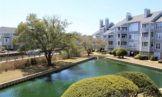 Manteo Condo | Buccaneer Village 514 | Canal Front | Private Balcony