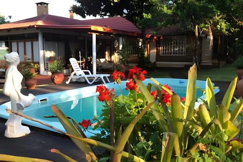 Obera House | Cabañas con piscina en la entrada de Oberá