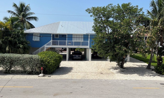 Breezeswept Beach Estates House | Canal Front Home to Dock and lift your boat in Lower Keys Paradise