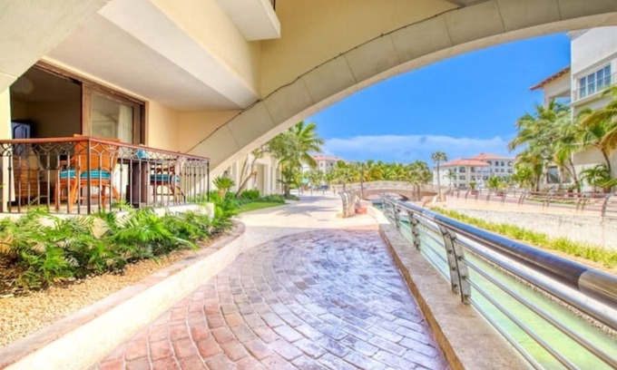 Cap Cana Marina House | Canal-view Loft, walking distance to Api Beach!