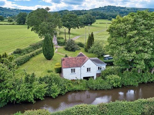 Llanover House | Canalside boathouse in the park