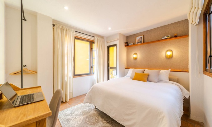 La Candelaria Apartment | Candelaria | Lux Vintage 2BR | Chimney, Patio, BBQ
