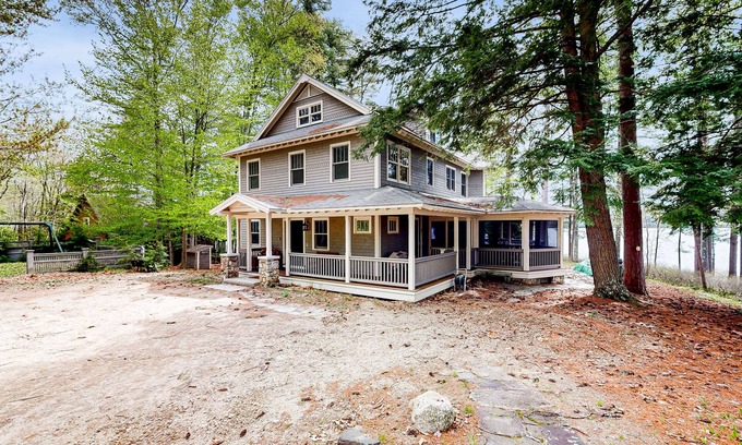 Meredith House | Captivating waterfront home with private dock & beach, lake views