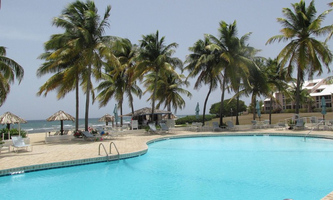 Estate Salt River Condo | Caribbean colors on wide open estate on a long sandy swimming beach.