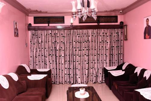 Namugongo Apartment | Carmella Exquisite Home Jjanda
