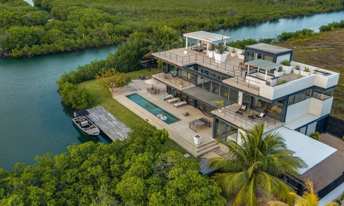 Placencia Villa | Casa Balam, A Stunning Waterfront Villa, w/Boat, 40ft Pool & Rooftop Bar